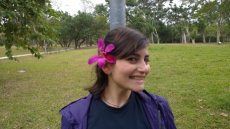 Eleni, with flower decorating her hair.